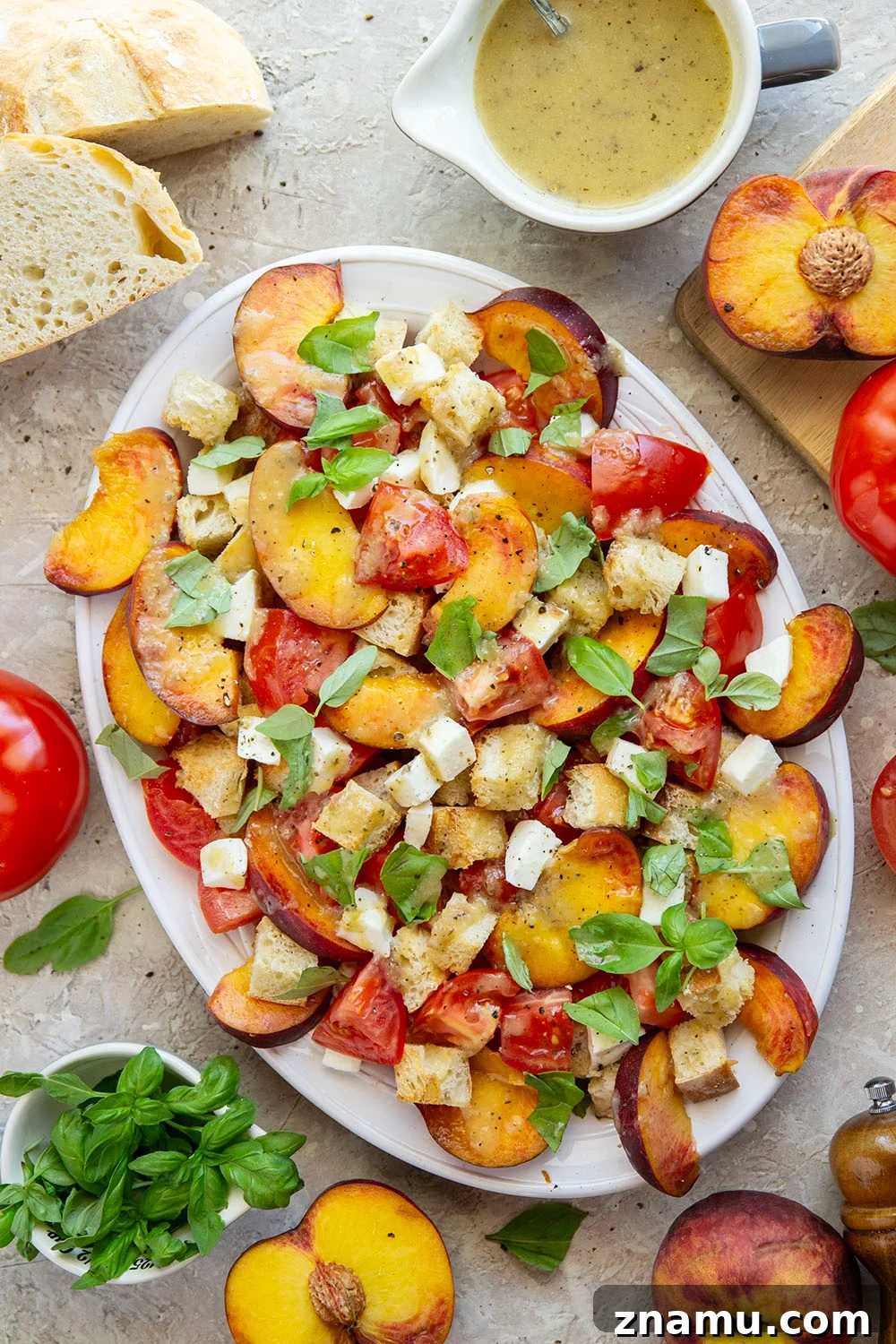 Peach Panzanella: Summer Bread Salad with Basil 6 This summery peach panzanella salad is loaded down with crisp toasted bread, juicy peach slices, sweet tomatoes, and lots of fresh basil. A flavorful shallot dressing drizzled on top adds so much flavor!