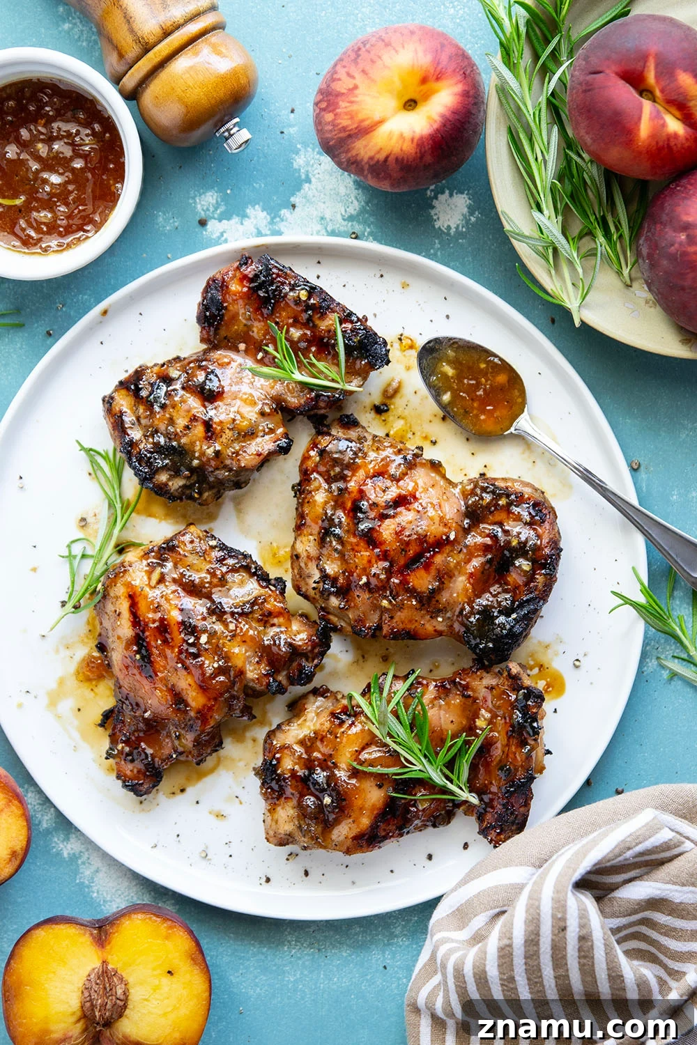 Honey Peach-Glazed Chicken with Sticky Sweet Sauce 2 A sweet, jammy honey peach glaze coats every inch of juicy grilled chicken thighs in this peach glazed chicken that's incredible with fresh summer peaches.