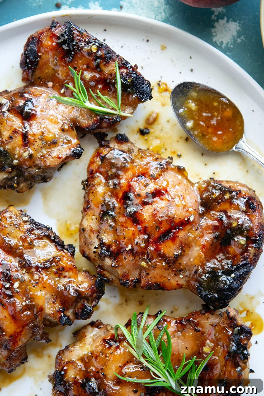 Honey Peach-Glazed Chicken with Sticky Sweet Sauce 4 A sweet, jammy honey peach glaze coats every inch of juicy grilled chicken thighs in this peach glazed chicken that's incredible with fresh summer peaches.