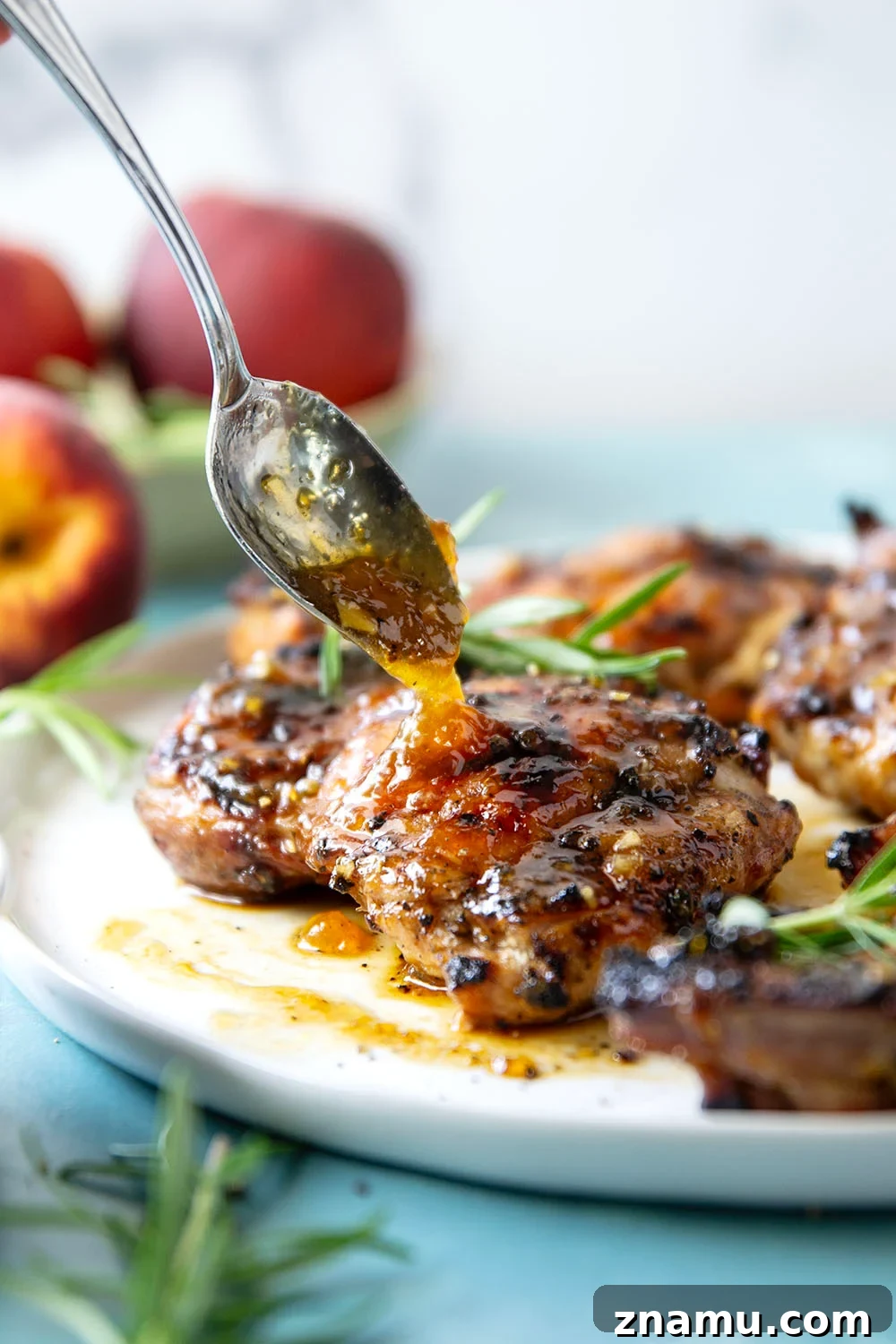 Honey Peach-Glazed Chicken with Sticky Sweet Sauce 5 A sweet, jammy honey peach glaze coats every inch of juicy grilled chicken thighs in this peach glazed chicken that's incredible with fresh summer peaches.