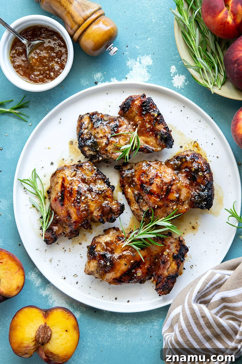 Honey Peach-Glazed Chicken with Sticky Sweet Sauce 6 A sweet, jammy honey peach glaze coats every inch of juicy grilled chicken thighs in this peach glazed chicken that's incredible with fresh summer peaches.