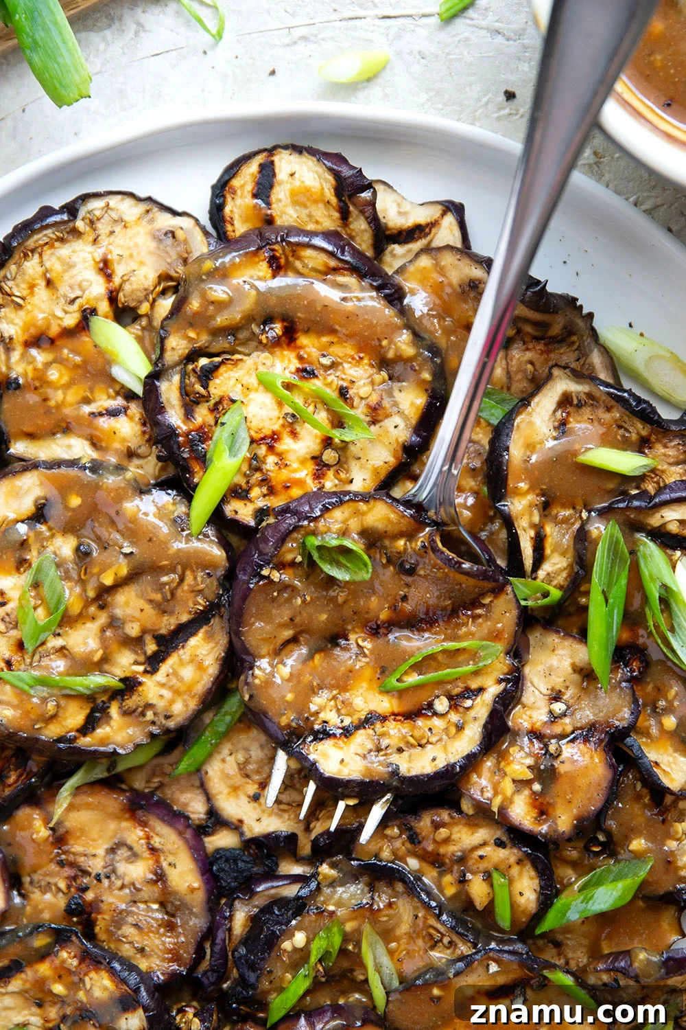 Grilled Eggplant with Miso Glaze 2 Grilled until crispy and drizzled in a flavorful miso ginger sauce, this miso grilled eggplant is the perfect way to use an abundance of eggplant and goes well with any Asian-inspired meal.