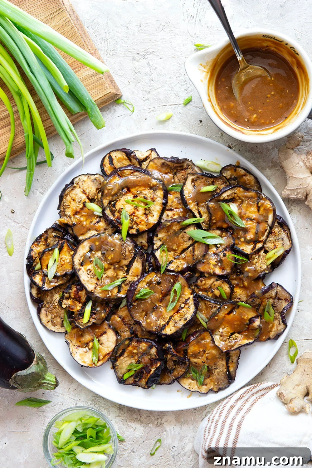 Grilled Eggplant with Miso Glaze 5 Grilled until crispy and drizzled in a flavorful miso ginger sauce, this miso grilled eggplant is the perfect way to use an abundance of eggplant and goes well with any Asian-inspired meal.