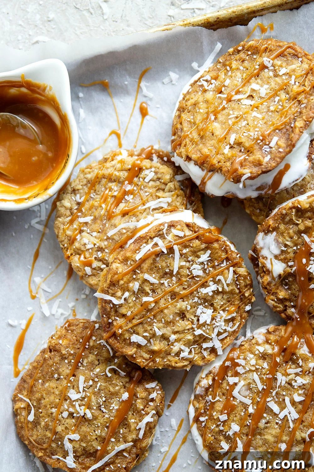 Salted Caramel Coconut Ice Cream Sandwiches 2 A base of crispy coconut cookies, homemade salted caramel, and a filling of creamy vanilla ice cream take these caramel ice cream sandwiches completely over the top!