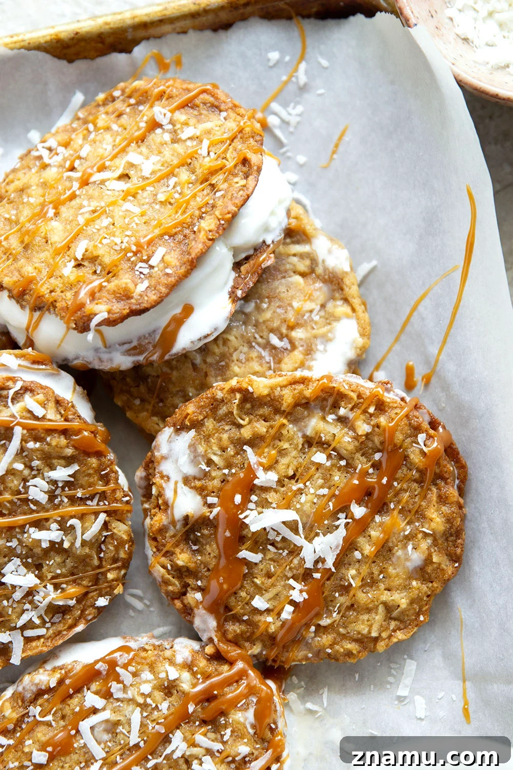 Salted Caramel Coconut Ice Cream Sandwiches 6 A base of crispy coconut cookies, homemade salted caramel, and a filling of creamy vanilla ice cream take these caramel ice cream sandwiches completely over the top!