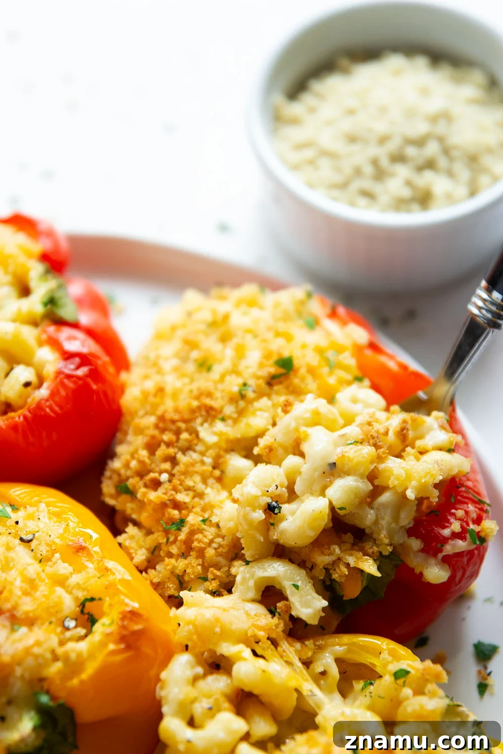 Creamy Mac and Cheese Stuffed Bell Peppers 5 Rich and cheesy mac and cheese stuffed peppers feature tender sweet peppers stuffed with creamy mac and cheese with lots of crispy breadcrumbs on top.